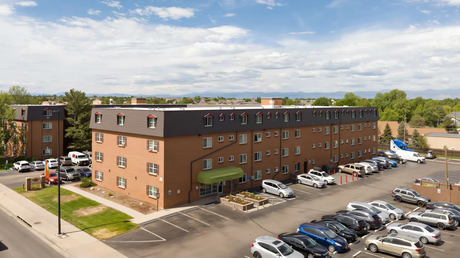 Aerial view of Meridian Garden Apartments and resident parking in Denver, Colorado