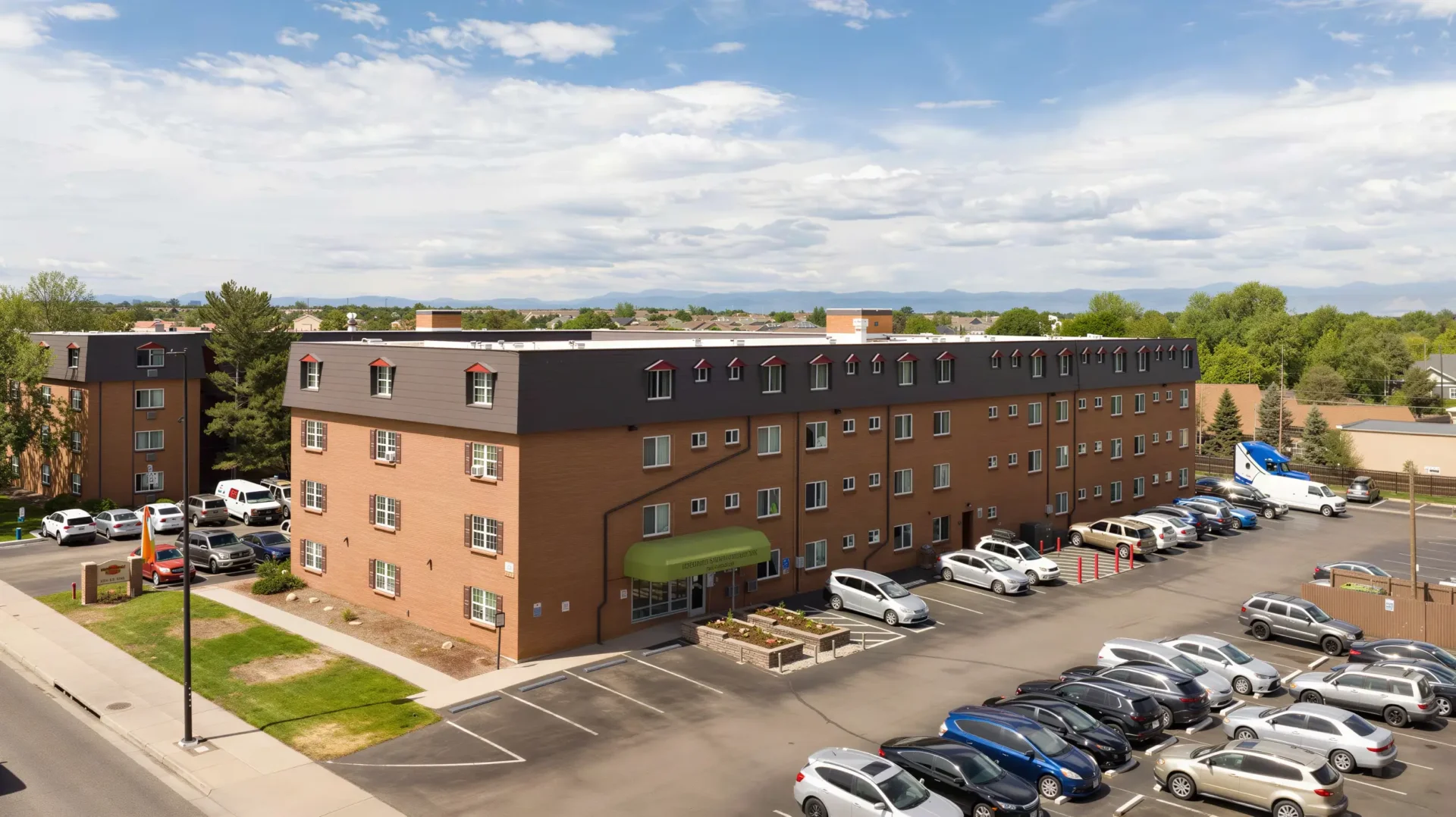 Aerial view of Meridian Garden Apartments and resident parking in Denver, Colorado